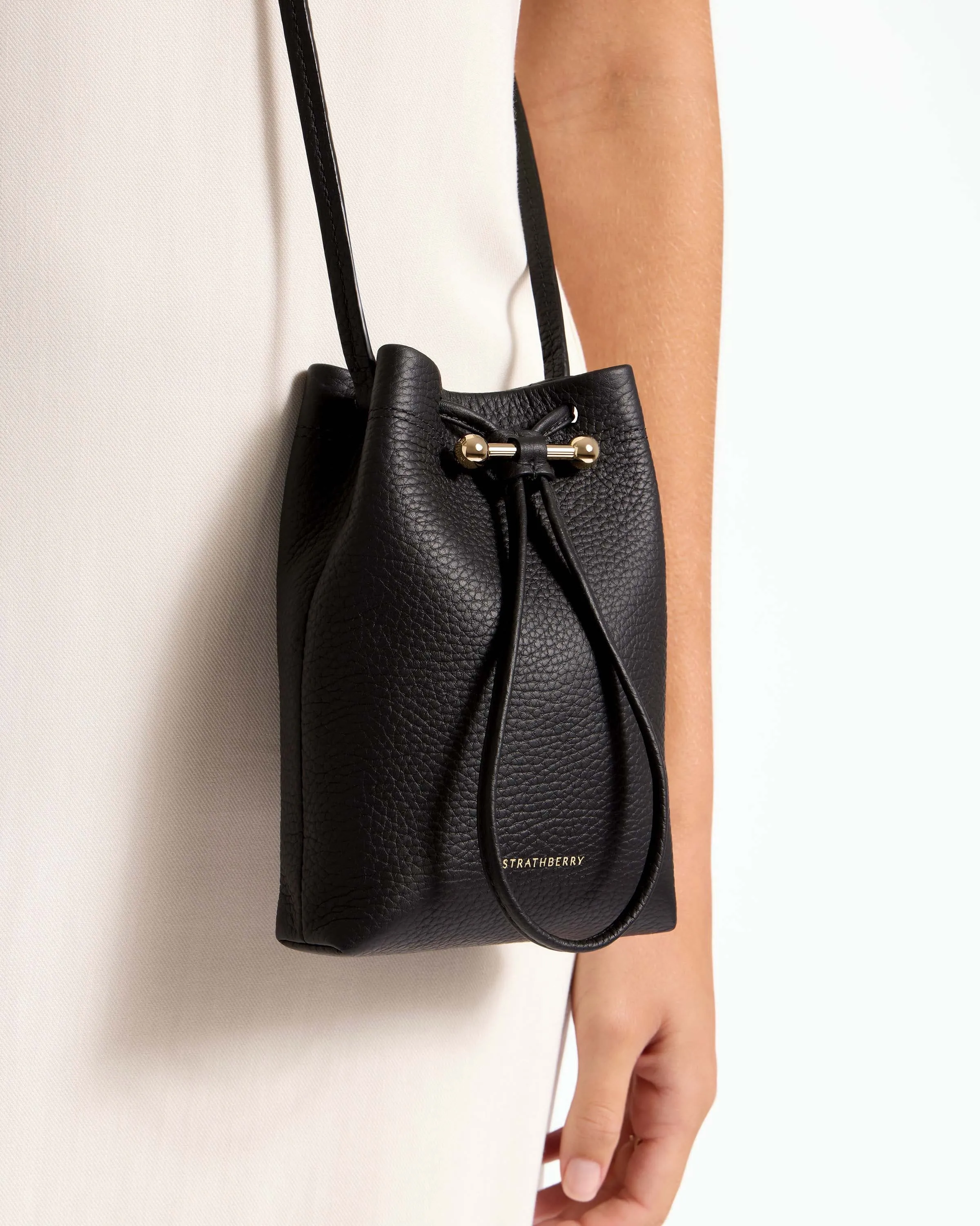 Sleek & Stylish Ossette Black Midi Pouch Handbag